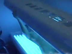 Girl farting on the tanning bed