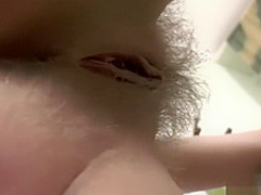 Cutie filmed her masturbation in the kitchen