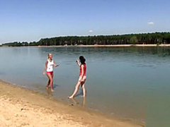 Two hot lesbians bang at the beach