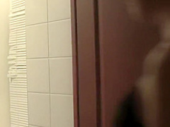 Beautiful woman with a shaved pussy sucking cock