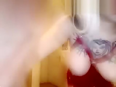 This skinny blond knows how to tease you with her tight red PVC outfit and