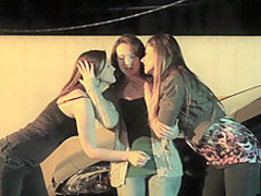 Sexy babes licking each other outdoors
