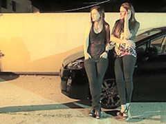 Sexy babes licking each other outdoors