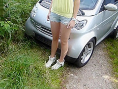 German blonde gets a cum load on a field road