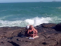 Interracial threesome at the beach