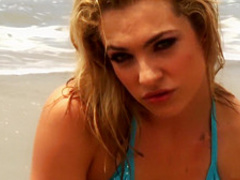 Bailey Blue squirting by the sea