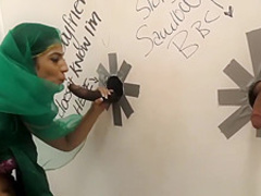 Pretty Pakistani babe visits the gloryhole for black cock