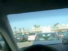 Beautiful blond gives great blowjob in public parking lot