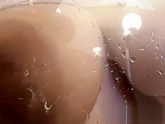 Marvelous Messalina showers her body and big tits