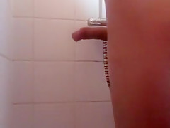 Boy takes a shower and cums against the wall In camping shower