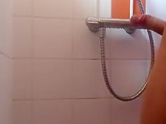 Boy takes a shower and cums against the wall In camping shower
