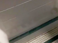 Taking a piss in the urinal at the library