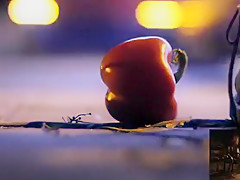 POV crushing of capsicum in shiny Doc Martens combat boots