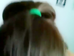 Amanda riding her toy