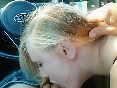 Blonde gives neighbor blowjob in car