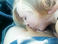 Blonde gives neighbor blowjob in car