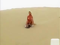 Busty Babes Have Fun Doing Sand Boarding