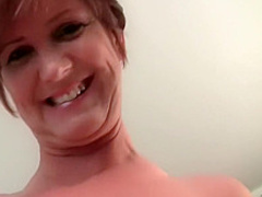 Granny loves to tease with her big tits and juicy pussy