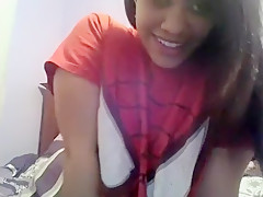 Spiderman fan plays with her shave pussy tills she squirts