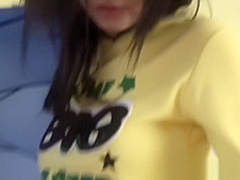 Dark haired hottie rubs her twat