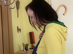 Dark haired hottie rubs her twat