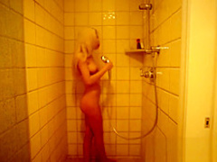 Tiny blonde with big tits takes dick