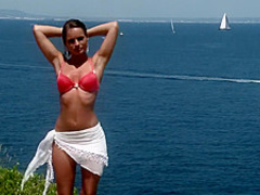 Hot babe strips on a cliff with a great view