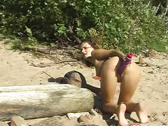 Masturbating on the beach