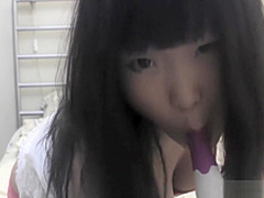 Big assed Asian babe masturbating