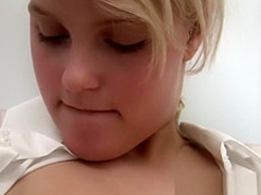 Young blondie in a bath tub