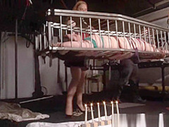 American goddess Carolina Pierce caged and spanked