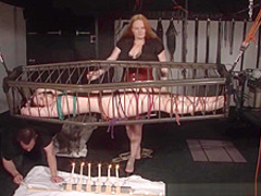 American goddess Carolina Pierce caged and spanked