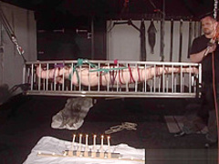 American goddess Carolina Pierce caged and spanked