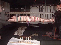 American goddess Carolina Pierce caged and spanked