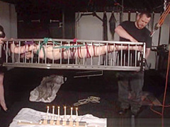 American goddess Carolina Pierce caged and spanked