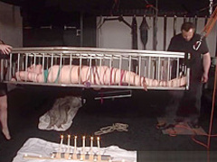 American goddess Carolina Pierce caged and spanked