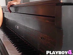 Beautiful blonde MILF playing a piano totally naked