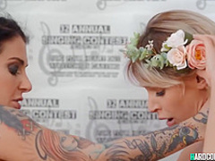 Lesbian singers tribbing before contest