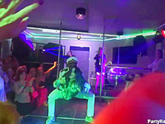 Naughty girls are taking turns sucking a handsome dancer's dick and getting fucked in the night club