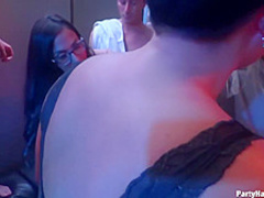 Naughty girls are taking turns sucking a handsome dancer's dick and getting fucked in the night club