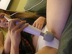 Naive schoolgirl is showing her fresh pussy and moaning while getting stimulated with a vibrator