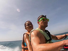 Amateur Thai girlfriend gives him a blowjob in public