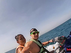 Amateur Thai girlfriend gives him a blowjob in public