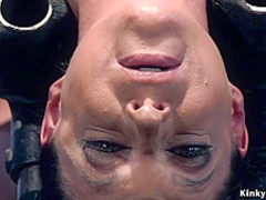 Slut is whipped in doggy device bdsm