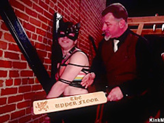 Slaves get paddle and whip in orgy