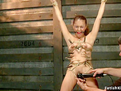 Zippered slut is whipped and toyed