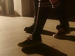 Blindfolded slave is locked in stocks