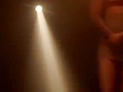 Blindfolded slave is locked in stocks