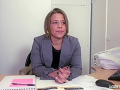 Kinky milf is lying on the desk, while a young guy is drilling her soft pussy