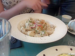 Hot, blonde masseuse with small tits is wearing black stockings and getting fucked from the back